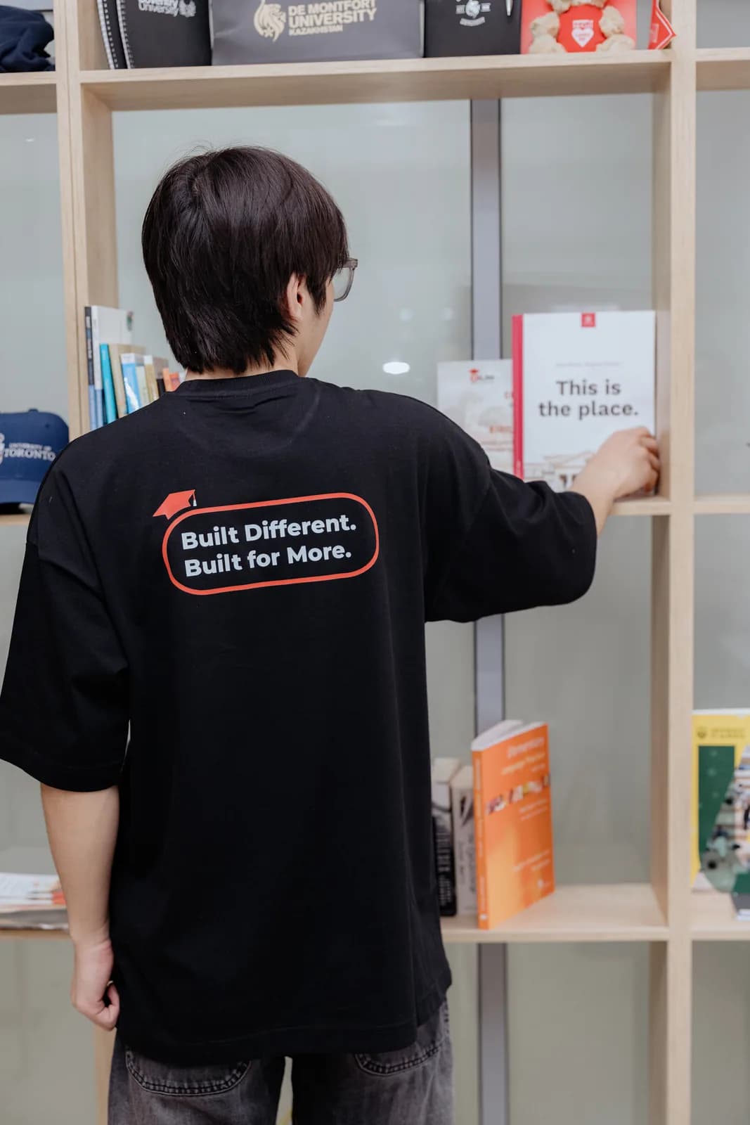 Толстовка школы со слоганом Built Different. Built for More.